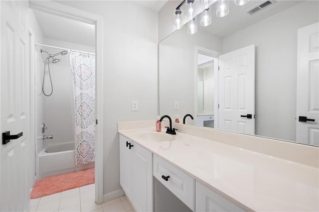 full bathroom with shower / bathtub combination with curtain, visible vents, vanity, and tile patterned floors