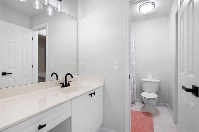 full bathroom featuring visible vents, toilet, vanity, tile patterned flooring, and baseboards