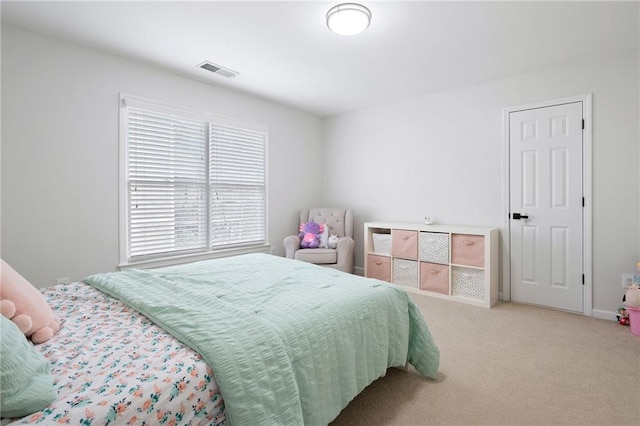 carpeted bedroom with visible vents