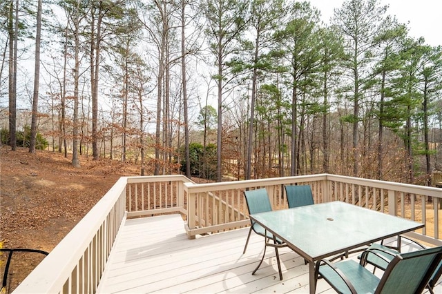 deck featuring outdoor dining area