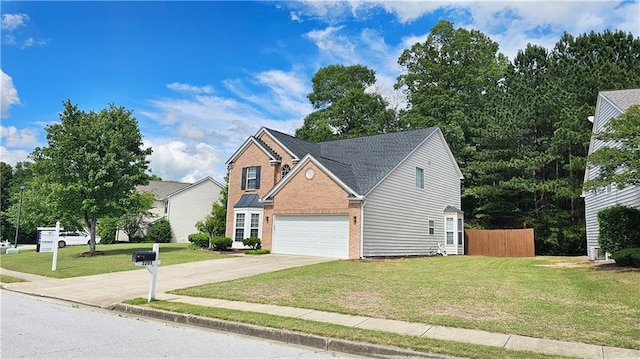 traditional-style home with concrete driveway, brick siding, and a garage