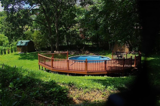 13 Travis Rd, Rossville, GA 30741 - outdoor pool with a storage unit, a yard, and a deck