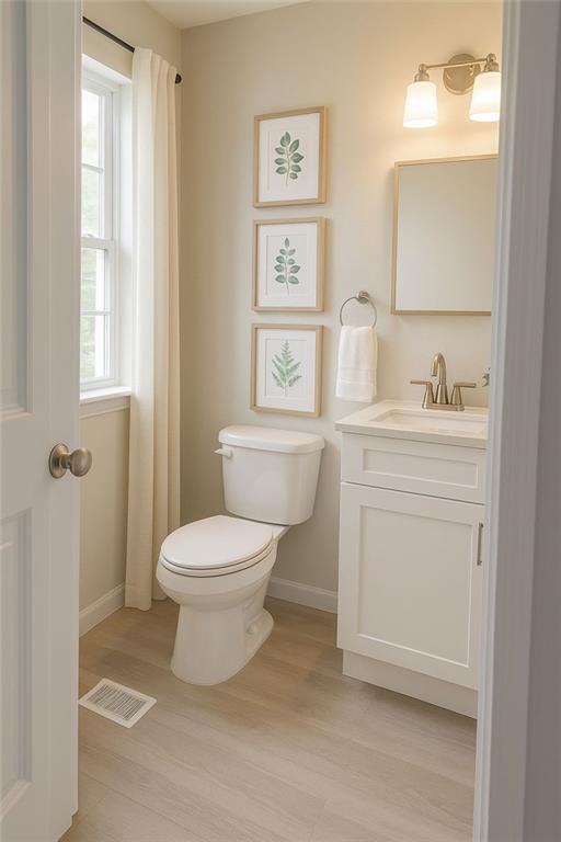 13 Travis Rd, Rossville, GA 30741 - half bathroom featuring wood finished floors and vanity