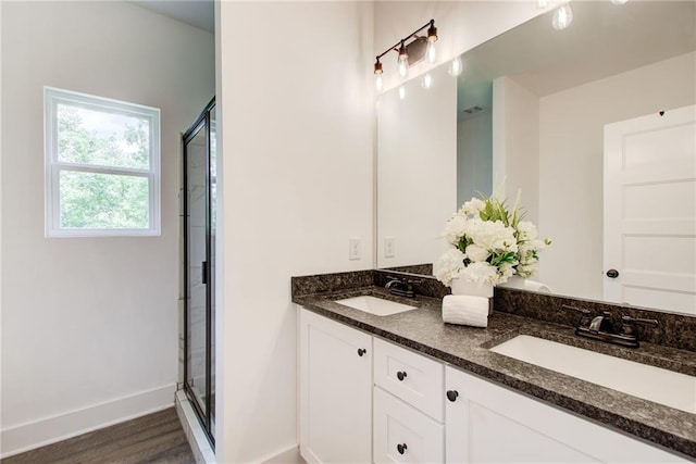 271 Moorings Run, Jasper, GA 30143 - full bathroom with double vanity, a stall shower, and wood finished floors