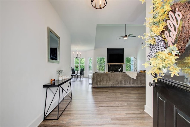271 Moorings Run, Jasper, GA 30143 - entryway featuring a chandelier, a ceiling fan, wood finished floors, and a fireplace