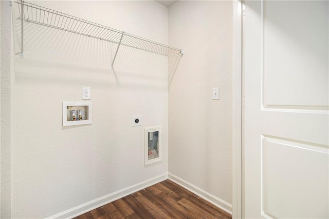 washroom with dark hardwood / wood-style flooring, hookup for a washing machine, and electric dryer hookup