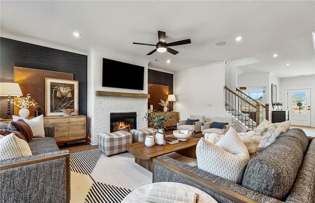 363 Aidens Blf, Jefferson, GA 30549 - living area featuring stairs, a ceiling fan, recessed lighting, a fireplace, and crown molding