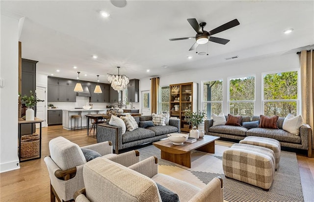 363 Aidens Blf, Jefferson, GA 30549 - living room featuring a chandelier, recessed lighting, ceiling fan, and light wood-type flooring