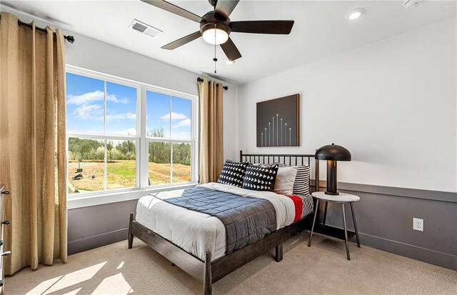 363 Aidens Blf, Jefferson, GA 30549 - bedroom with light colored carpet, baseboards, and a ceiling fan