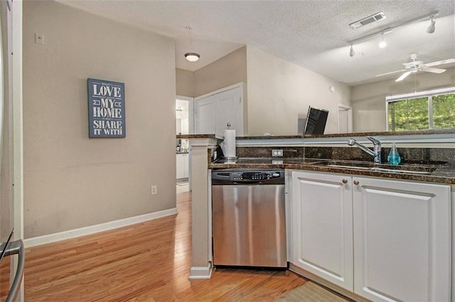 10 Perimeter Summit Blvd NE Unit 4223, Brookhaven, GA 30319 - kitchen featuring dishwasher, light wood-type flooring, white cabinets, a ceiling fan, and dark stone countertops