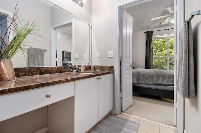 10 Perimeter Summit Blvd NE Unit 4223, Brookhaven, GA 30319 - bathroom with ensuite bath, vanity, and tile patterned floors