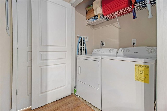 10 Perimeter Summit Blvd NE Unit 4223, Brookhaven, GA 30319 - laundry area featuring washer and clothes dryer and light wood finished floors