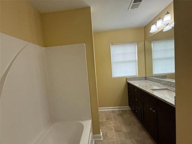 102 Daisy Cir, Mcdonough, GA 30252 - bathroom featuring vanity and baseboards