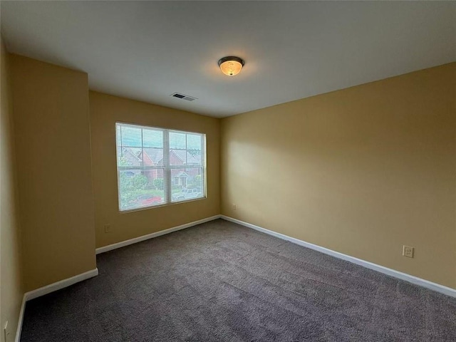 102 Daisy Cir, Mcdonough, GA 30252 - unfurnished room featuring dark colored carpet and baseboards