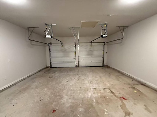 102 Daisy Cir, Mcdonough, GA 30252 - garage with a garage door opener and baseboards
