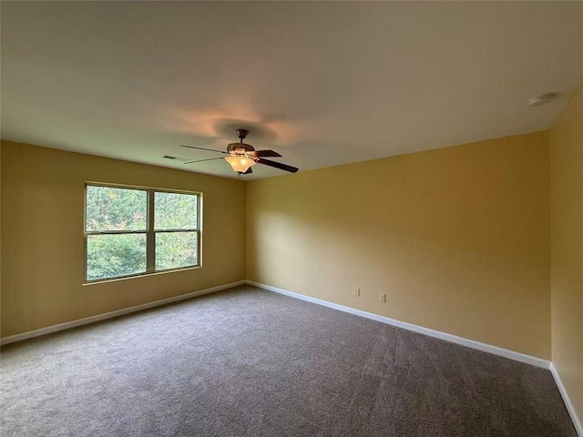 102 Daisy Cir, Mcdonough, GA 30252 - carpeted empty room featuring ceiling fan, baseboards, and a smoke detector