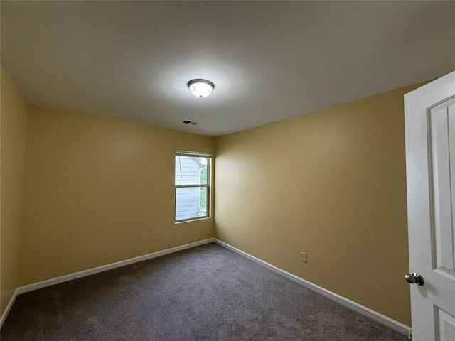 102 Daisy Cir, Mcdonough, GA 30252 - unfurnished room with baseboards and dark carpet