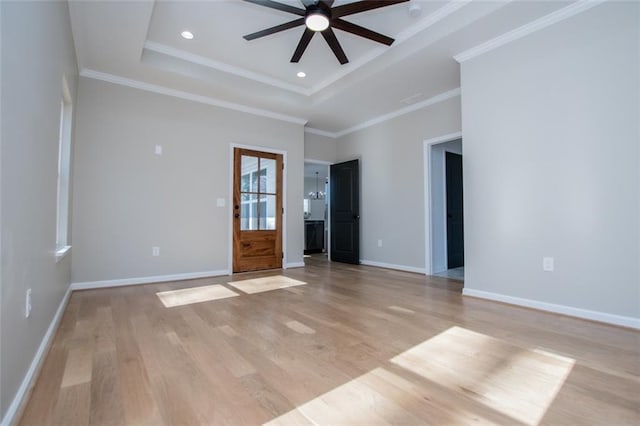 90 Ayers Rd, Bowdon, GA 30108 - empty room with ceiling fan, light wood-style floors, a tray ceiling, ornamental molding, and recessed lighting