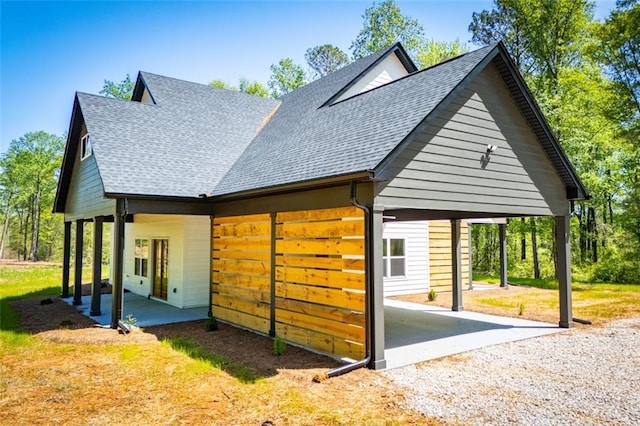 90 Ayers Rd, Bowdon, GA 30108 - view of property exterior with roof with shingles and a carport