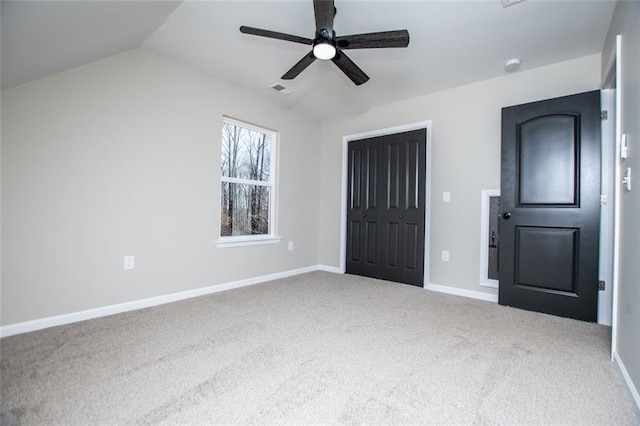 90 Ayers Rd, Bowdon, GA 30108 - unfurnished bedroom with carpet flooring, a closet, a ceiling fan, and lofted ceiling