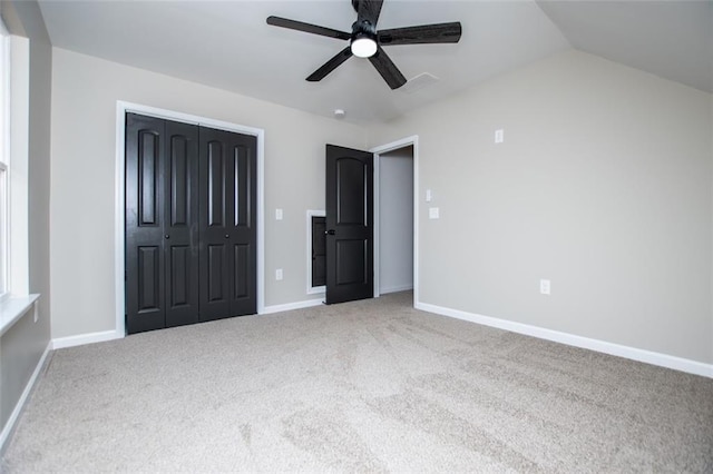 90 Ayers Rd, Bowdon, GA 30108 - unfurnished bedroom featuring a closet, carpet, a ceiling fan, and lofted ceiling