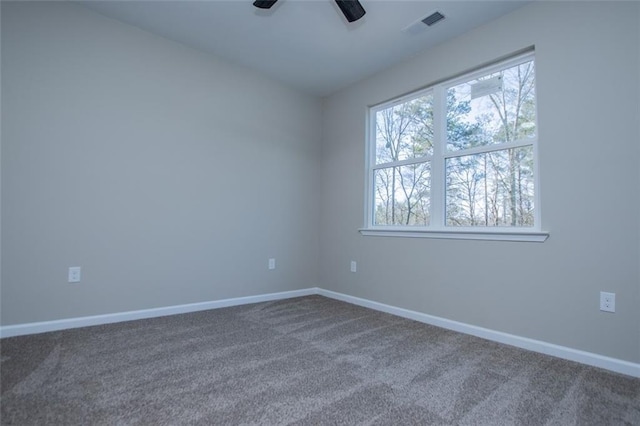 90 Ayers Rd, Bowdon, GA 30108 - spare room with dark colored carpet and ceiling fan