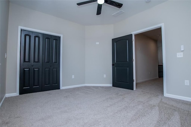 90 Ayers Rd, Bowdon, GA 30108 - unfurnished bedroom with carpet, a closet, and ceiling fan