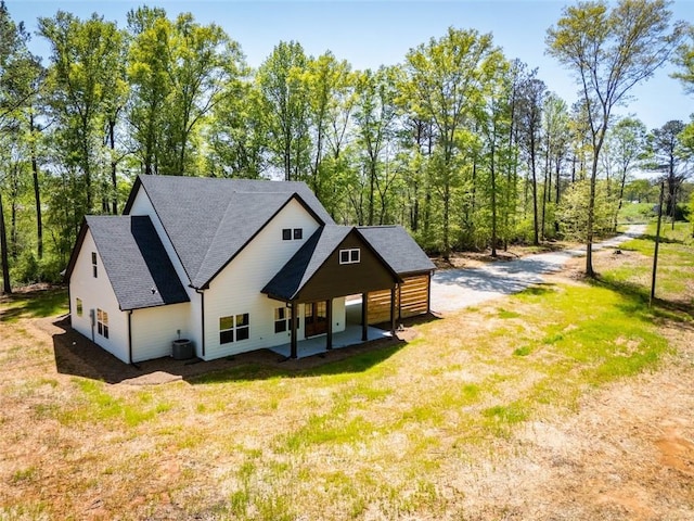 90 Ayers Rd, Bowdon, GA 30108 - view of front facade featuring a front yard and a shingled roof