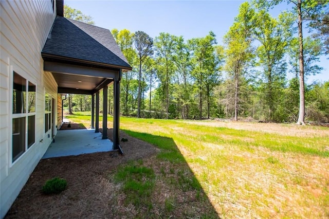 90 Ayers Rd, Bowdon, GA 30108 - view of grassy yard with a patio