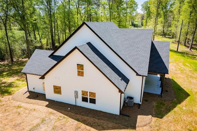 90 Ayers Rd, Bowdon, GA 30108 - view of side of property with a shingled roof and a central air condition unit