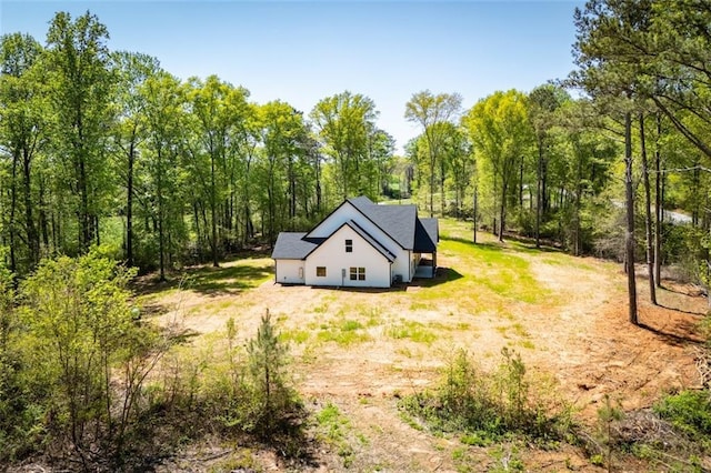 90 Ayers Rd, Bowdon, GA 30108 - view from above of property with a heavily wooded area
