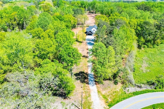 90 Ayers Rd, Bowdon, GA 30108 - aerial view of property and surrounding area featuring a heavily wooded area