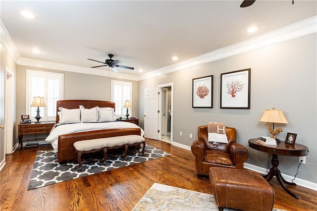 bedroom with ornamental molding, recessed lighting, baseboards, and wood finished floors