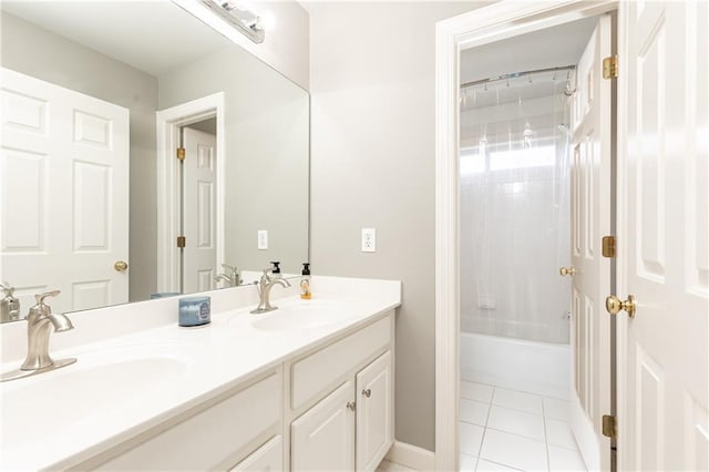 full bath featuring tile patterned flooring, shower / bath combination, a sink, and double vanity