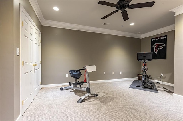 exercise area with ornamental molding, visible vents, and baseboards