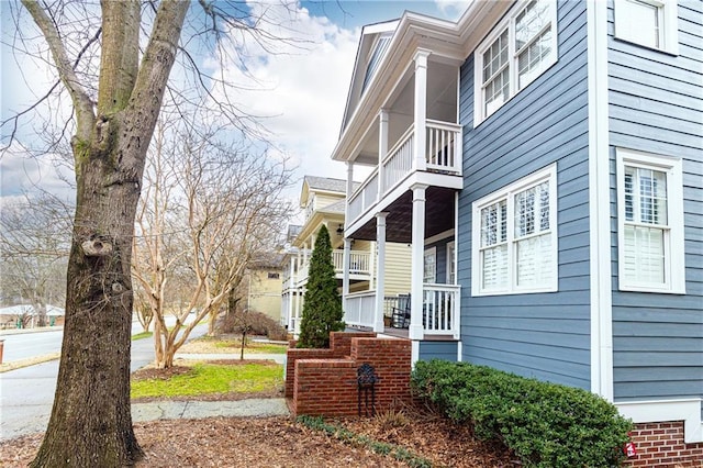 view of home's exterior with a porch