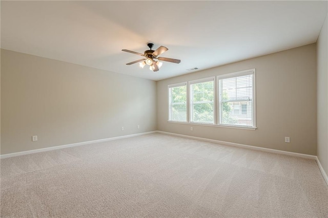 4404 Village Field Pl, Suwanee, GA 30024 - unfurnished room featuring baseboards, a ceiling fan, and light carpet