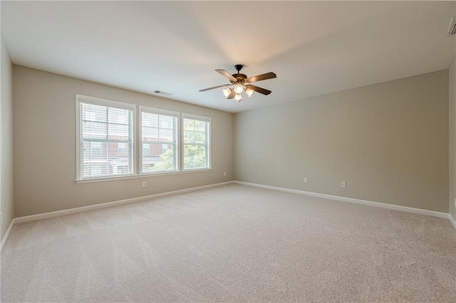 4404 Village Field Pl, Suwanee, GA 30024 - empty room with ceiling fan, baseboards, and light carpet