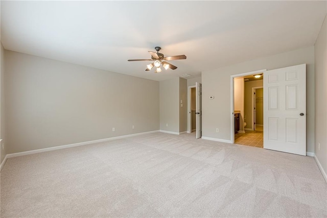 4404 Village Field Pl, Suwanee, GA 30024 - unfurnished bedroom featuring light colored carpet, baseboards, ensuite bath, and ceiling fan