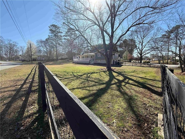 view of yard with fence