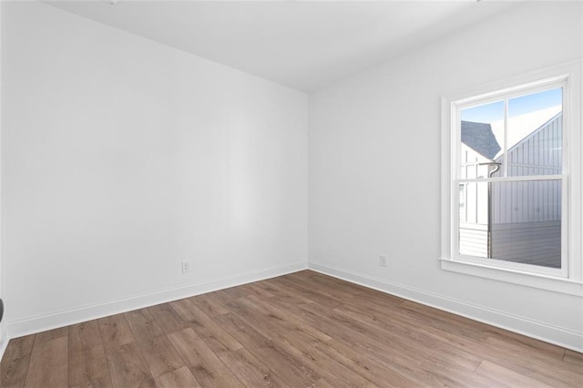 3317 Stillwood Ln, Hapeville, GA 30354 - spare room featuring wood finished floors and baseboards
