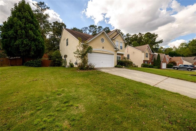 view of front of property with a garage and a front lawn