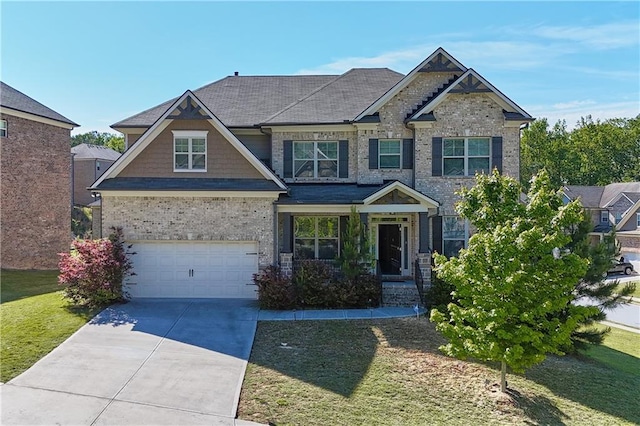 3259 Ivy Crossing Dr, Buford, GA 30519 - craftsman-style home with driveway, an attached garage, a front lawn, brick siding, and roof with shingles