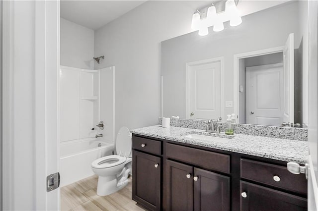 3259 Ivy Crossing Dr, Buford, GA 30519 - full bathroom featuring vanity, toilet, shower / washtub combination, and wood finished floors