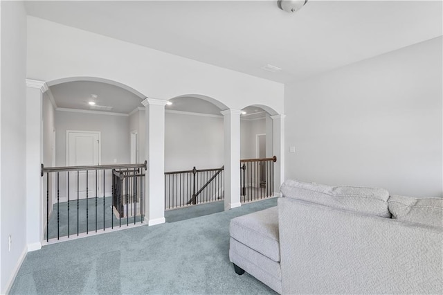3259 Ivy Crossing Dr, Buford, GA 30519 - sitting room with an upstairs landing, carpet flooring, decorative columns, crown molding, and baseboards