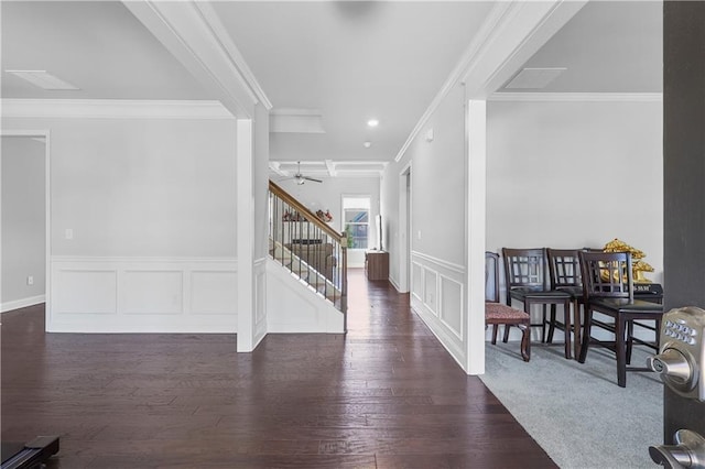 3259 Ivy Crossing Dr, Buford, GA 30519 - foyer with stairs, crown molding, a ceiling fan, dark wood-style floors, and a wainscoted wall