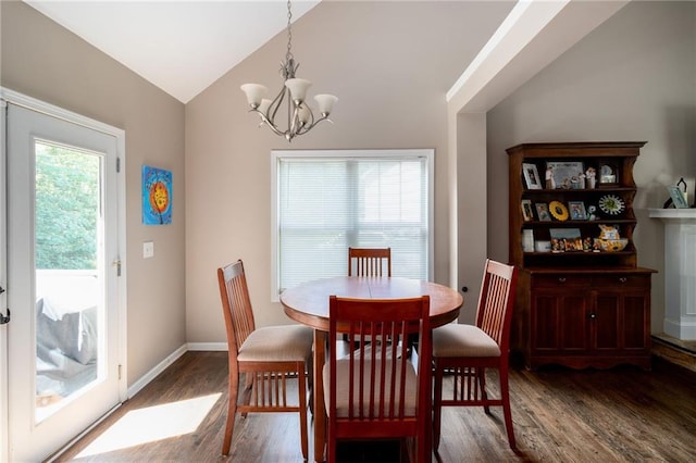19 Autumn Pl NE, White, GA 30184 - dining room featuring wood finished floors, a chandelier, and vaulted ceiling