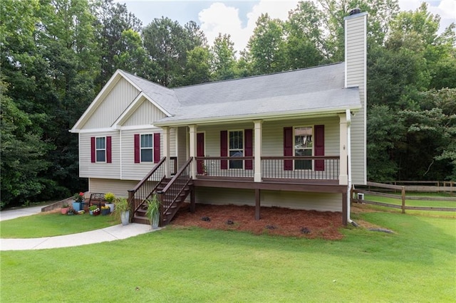19 Autumn Pl NE, White, GA 30184 - ranch-style home featuring covered porch, a chimney, board and batten siding, and view of scattered trees