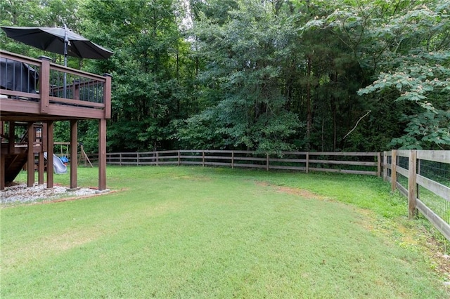 19 Autumn Pl NE, White, GA 30184 - fenced backyard with a deck