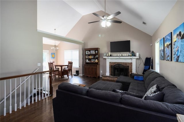 19 Autumn Pl NE, White, GA 30184 - living area with dark wood finished floors, a chandelier, a ceiling fan, high vaulted ceiling, and a brick fireplace